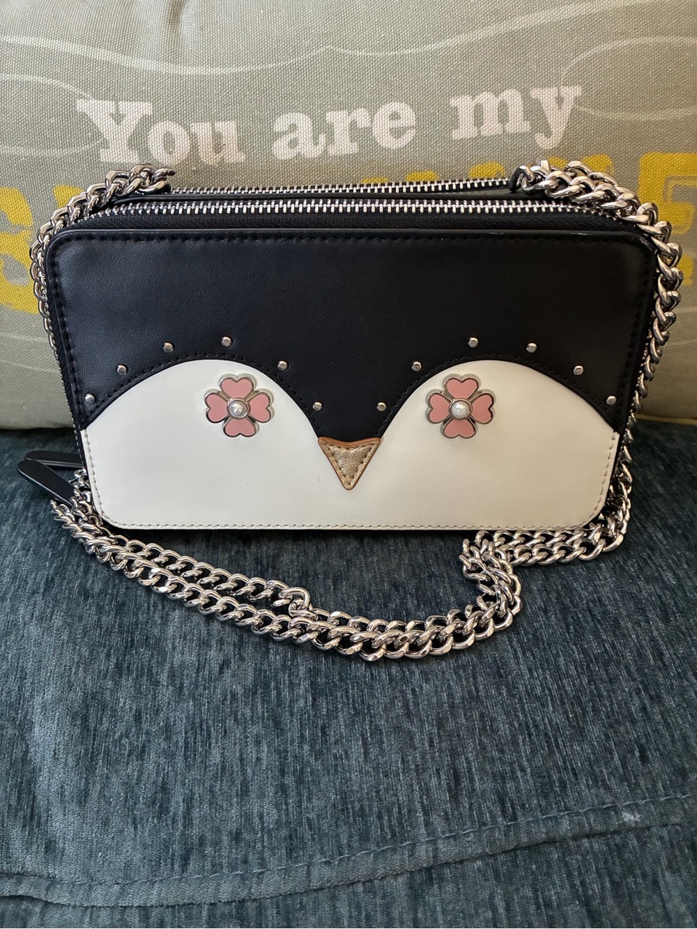 kate spade Black and White Floral Eyes Penguin Crossbody with Silver Chain